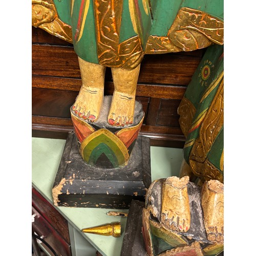 56 - POLYCHROME PAINTED GILDED THAI WOODEN FIGURE AND ONE OTHER A/F