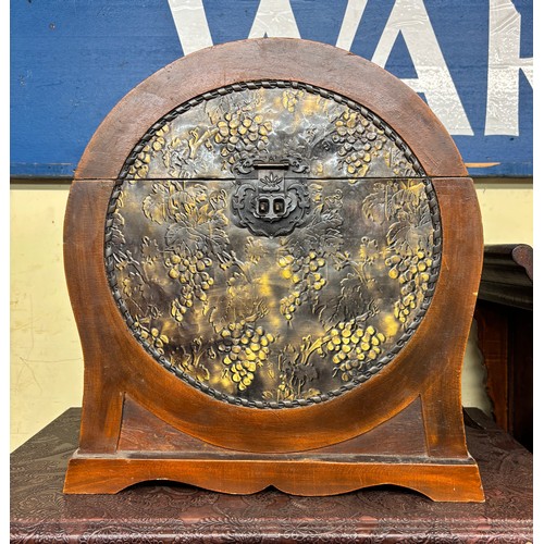 67 - CIRCULAR EASTERN SHEET METAL EMBOSSED CABINET WITH CARRYING HANDLES