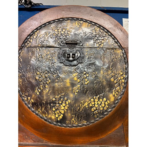 67 - CIRCULAR EASTERN SHEET METAL EMBOSSED CABINET WITH CARRYING HANDLES