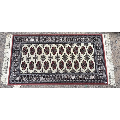 40 - PINK GROUND GEOMETRIC CARPET RUNNER