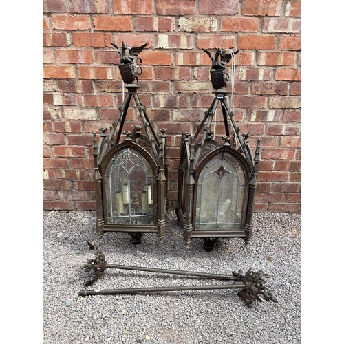 241 - PAIR OF HEAVY CAST GOTHIC REVIVAL FOUR PANE HALL LANTERNS WITH EAGLE AND SHIELD CRESTINGS WITH SUSPE...