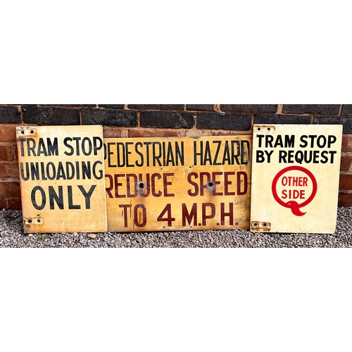 DOUBLE SIDED PAINTED TRAM STOP SIGNS AND PEDESTRAIN HAZARD SIGN