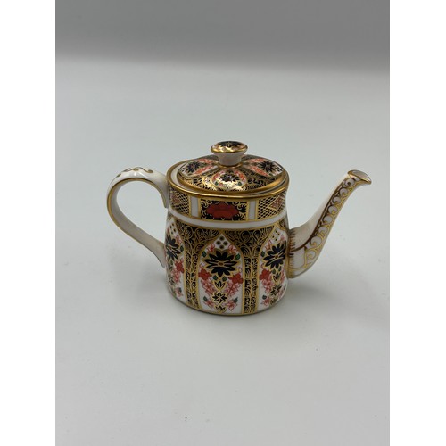 513 - ROYAL CROWN DERBY IMARI PATTERNED MINIATURE TEA SET ON OVAL TRAY (SECONDS)