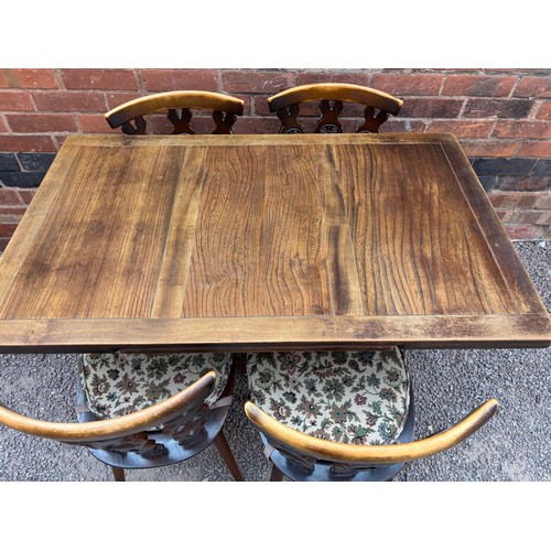 14 - ERCOL LYRE END DRAWER LEAF TABLE AND FOUR PRINCE OF WALES PLUME BACK CHAIRS