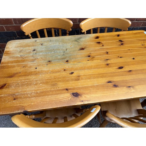 15 - PINE FARMHOUSE STYLE TABLE WITH LONG DRAWER AND FOUR SLAT BACK DINING CHAIRS