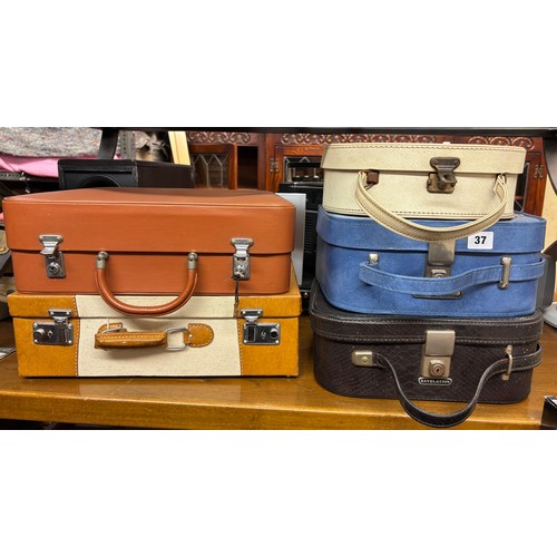 37 - SELECTION OF REVELATION AND CONSTELLATION LADIES VANITY CASES