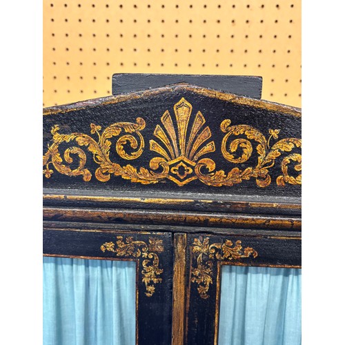 180 - EARLY 19TH CENTURY REGENCY  PAINTED GILT PEN WORK GLAZED COLLECTORS CABINET ON STAND