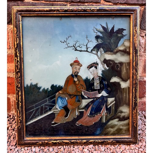266 - CHINESE REVERSE GLASS PAINTING OF FIGURES SEATED IN A CHINOISERIE LACQUERED FRAME