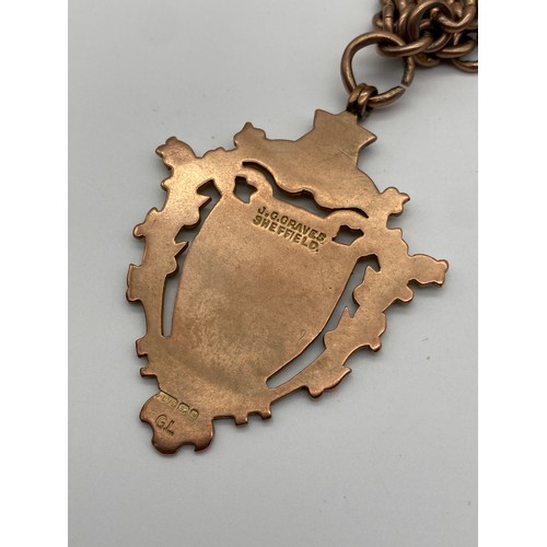 648 - 9CT ROSE GOLD ALBERT CHAIN WITH T BAR, SNAP SWIVEL FASTENER AND LARGE SHIELD FOB 75.2G APPROX