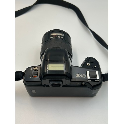 774 - PENTAX Z10, MINOLTA AF-S AND A CANON SURE SHOT Z135, PLUS A PAIR OF PRAKTICA SPORT 10X25 BINOCULARS