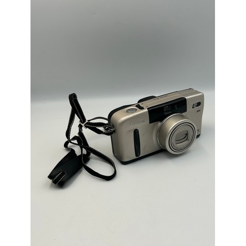 774 - PENTAX Z10, MINOLTA AF-S AND A CANON SURE SHOT Z135, PLUS A PAIR OF PRAKTICA SPORT 10X25 BINOCULARS