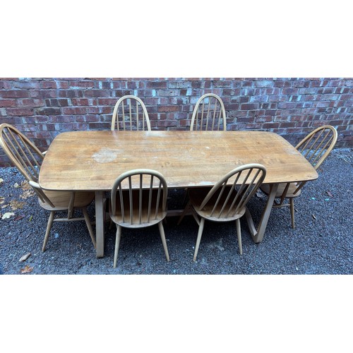 100A - ERCOL 513 BLONDE ELM RECTANGULAR DINING TABLE AND SIX HOOP BACK CHAIRS.