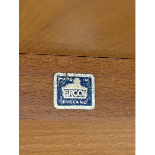 100A - ERCOL 513 BLONDE ELM RECTANGULAR DINING TABLE AND SIX HOOP BACK CHAIRS.