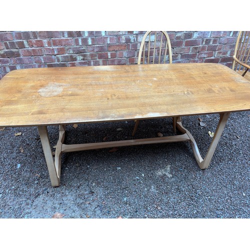 100A - ERCOL 513 BLONDE ELM RECTANGULAR DINING TABLE AND SIX HOOP BACK CHAIRS.