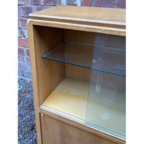 46 - 1950/60'S OAK SLIDING DOOR CABINET