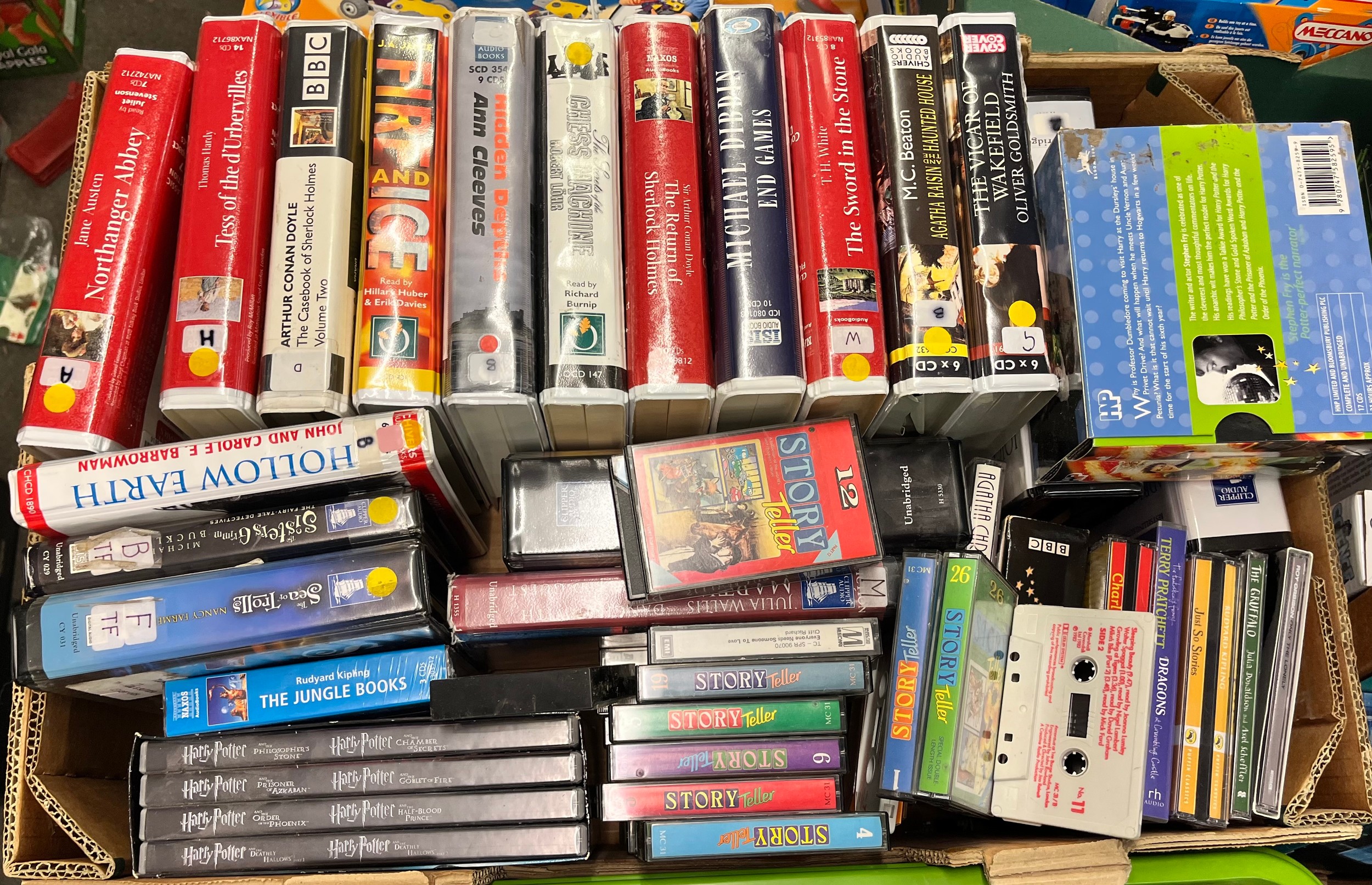 THREE CARTONS OF ASSORTED CASETTE AUDIO BOOKS AND GAME TAPES