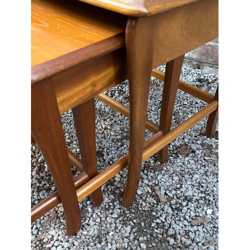 30 - TEAK NEST OF THREE TABLES