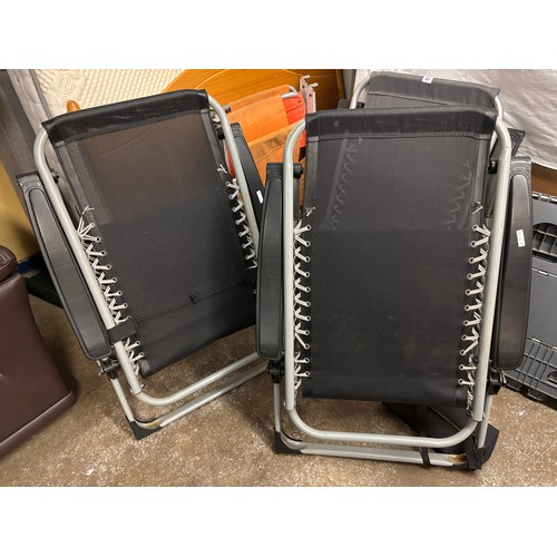 23 - TWO PAIRS OF FOLDING GARDEN CHAIRS