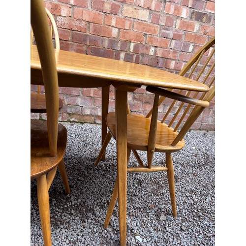 80 - ERCOL ELM WINDSOR DINING TABLE AND FOUR CHAIRS