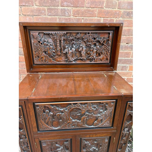 48 - CARVED ORIENTAL DARK WOOD DRINKS CABINET FOLD OUT HOME BAR A/F