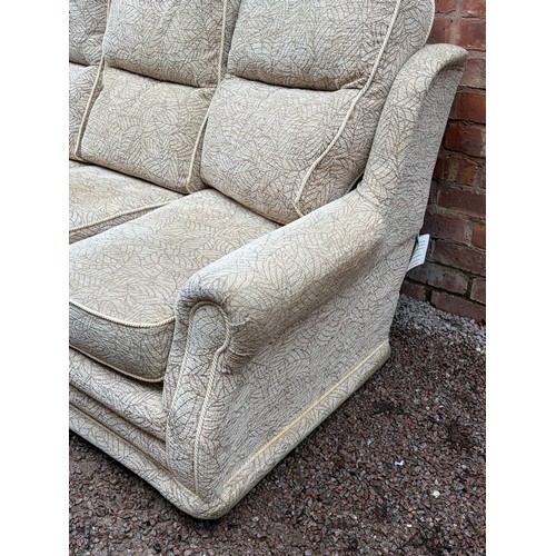 58 - MUSHROOM LEAF PATTERNED PIPED EDGED SOFA
