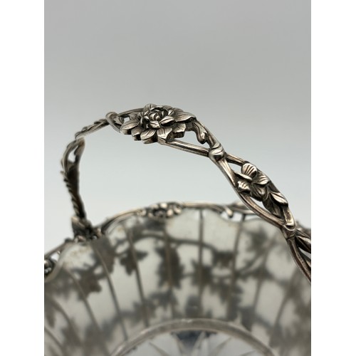 529 - 19TH CENTURY LONDON SILVER GLASS LINED BASKET WITH SWING HANDLE DECORATED WITH ACORNS ON TURNED FEET... 
