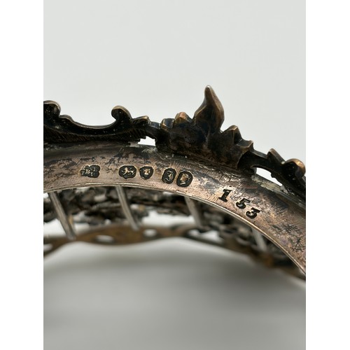 529 - 19TH CENTURY LONDON SILVER GLASS LINED BASKET WITH SWING HANDLE DECORATED WITH ACORNS ON TURNED FEET... 