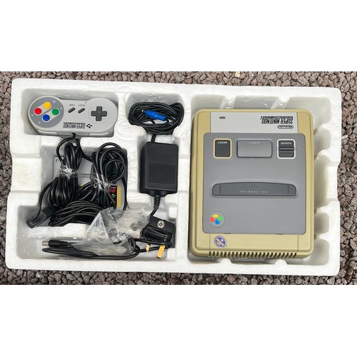 496 - BOXED NINTENDO SUPER NINTENDO ENTERTAINMENT SYSTEM AND SELECTION OF BOXED GAMES INC. MARIO AND KIRBY