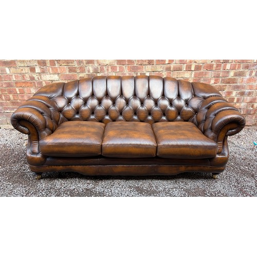 107 - VICTORIAN STYLE BROWN BUTTON BACK LEATHER CHESTERFIELD SOFA AND MATCHING FOOT STOOL