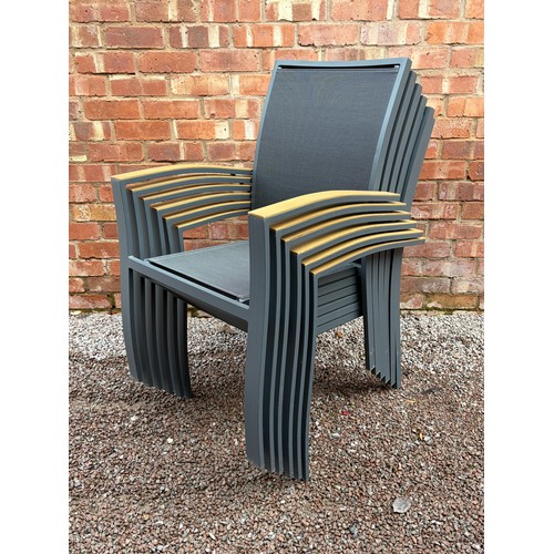 117 - CIRCULAR PATIO TABLE, SIX STACKABLE CHAIRS, PARASOL IN BOX WITH WEIGHTED BASE AND CUSHIONS IN NYLON ... 