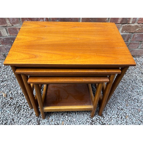 64 - TEAK NEST OF THREE TABLES