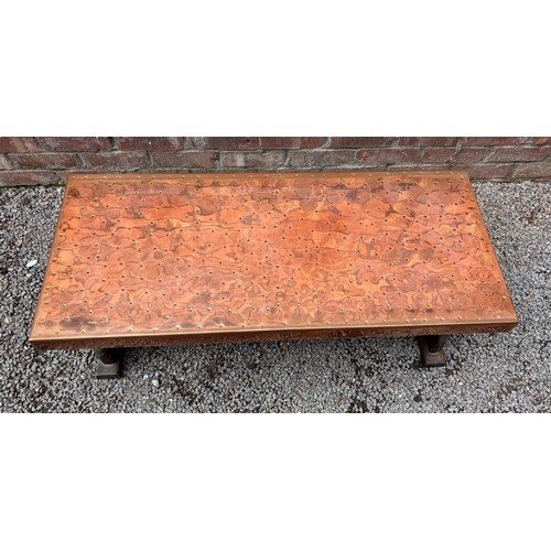 104 - COPPER BEATEN TOP TRESTLE END COFFEE TABLE