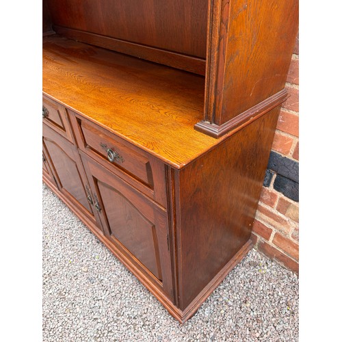 15 - OAK PANEL DOOR DRESSER WITH ARCHED GLAZED DOOR TOP