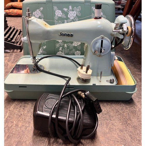 70 - CASED ELECTRIC SEWING MACHINE
