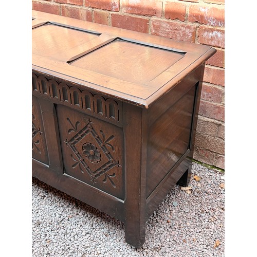 65 - OAK CARVED PANEL FRONT COFFER