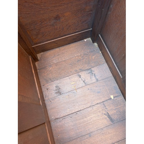 65 - OAK CARVED PANEL FRONT COFFER