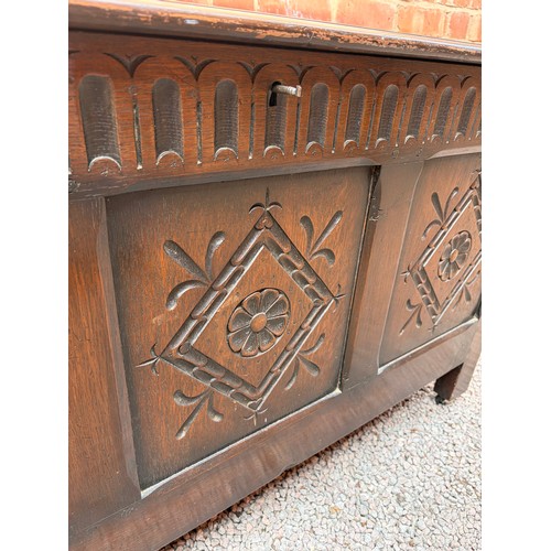 65 - OAK CARVED PANEL FRONT COFFER
