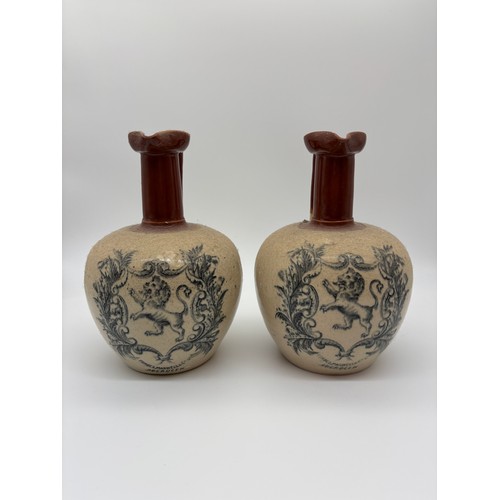 579 - PAIR OF FORBES MAXWELL AND CO SCOTTISH FLAGON JUGS