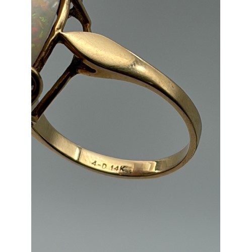 601 - 14CT GOLD CLAW SET OPAL AND DIAMOND RING 4.8G APPROX