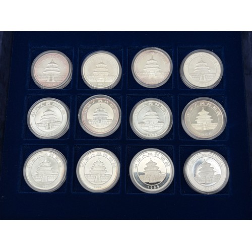 570 - THE OFFICIAL CHINA COMMEMORATIVE COIN COLLECTION 1989-2000 1 OZ SILVER 10 YUAN