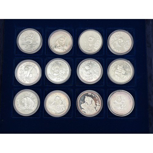 570 - THE OFFICIAL CHINA COMMEMORATIVE COIN COLLECTION 1989-2000 1 OZ SILVER 10 YUAN