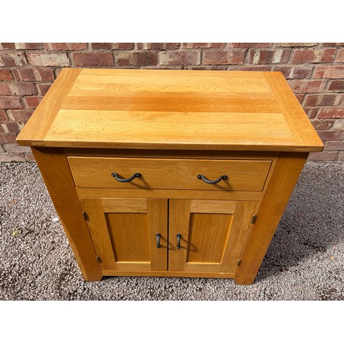 49 - MODERN OAK CUPBOARD WITH FRIEZE DRAWER