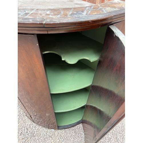 7 - GEORGE III MAHOGANY BOW FRONT HANGING CORNER CUPBOARD