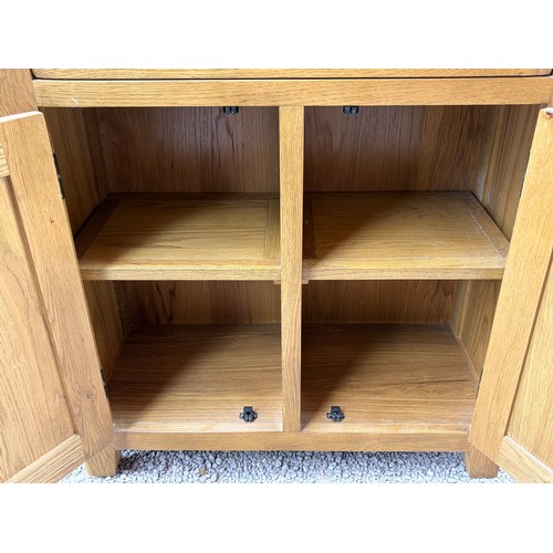 48 - LIGHT OAK CUPBOARD WITH DRAWER