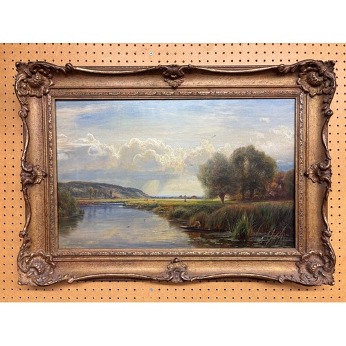 246 - W.L.BREEDEN (FL.1882-1920) OIL ON CANVAS FISHERMAN IN A RIVER LANDSCPAE IN GILT FRAME