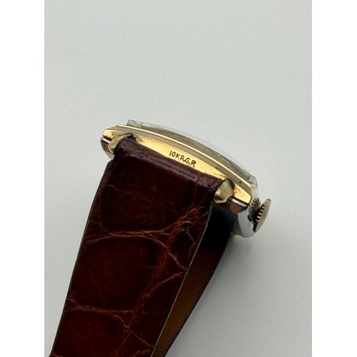 555 - LADIES SERVICES DATE ADJUST WRISTWATCH AND 10K RGP AMERICAN GOTHAM SQUARE FACE WRISTWATCH ON LEATHER... 
