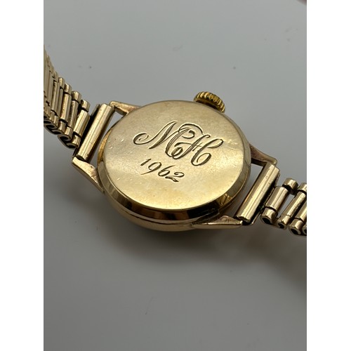 556 - LADIES TISSOT 9CT GOLD WATCH ON 9CT GOLD BRACELET STRAP 20G OVERALL