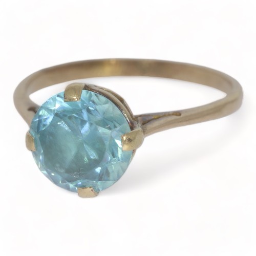 60 - A mid twentieth century single stone blue zircon set dress ring
The round faceted zircon measures ap... 