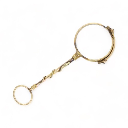 90 - A nineteenth century spring loaded lorgnette with a snake pattern handle.
Measuring approx. 127mm in... 