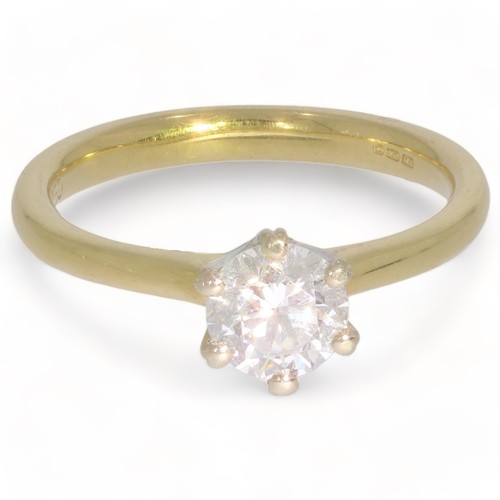 130 - A 18ct yellow and white gold single stone diamond ring
1 stone, Round brilliant cut. Colour: J/K. Cl... 